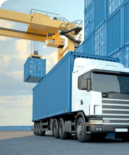 A truck stands parked next to a container, highlighting the connection between transportation and storage in logistics